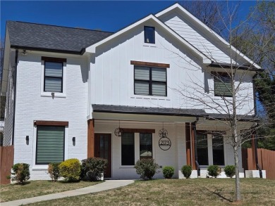 This 4-bedroom, 3-bathroom home offers the perfect blend of on Alfred Tup Holmes Golf Course in Georgia - for sale on GolfHomes.com, golf home, golf lot