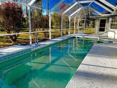 Spacious 5 bedroom POOL home in CYPRESS KNOLL ~ Nestled in one on The Grand Club Cypress Course in Florida - for sale on GolfHomes.com, golf home, golf lot