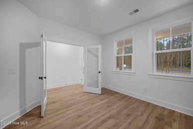 Introducing the Roberts plan by Hunter Quinn Homes in the on Brunswick Plantation and Golf Resorts in North Carolina - for sale on GolfHomes.com, golf home, golf lot