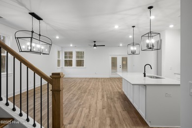 Introducing the Roberts plan by Hunter Quinn Homes in the on Brunswick Plantation and Golf Resorts in North Carolina - for sale on GolfHomes.com, golf home, golf lot