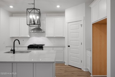 Introducing the Roberts plan by Hunter Quinn Homes in the on Brunswick Plantation and Golf Resorts in North Carolina - for sale on GolfHomes.com, golf home, golf lot