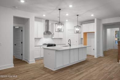 Introducing the Roberts plan by Hunter Quinn Homes in the on Brunswick Plantation and Golf Resorts in North Carolina - for sale on GolfHomes.com, golf home, golf lot