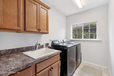 Custom-Built Home with Flexible Layout & Designer Finishes. This on Magnolia Point Golf and Country Club in Florida - for sale on GolfHomes.com, golf home, golf lot