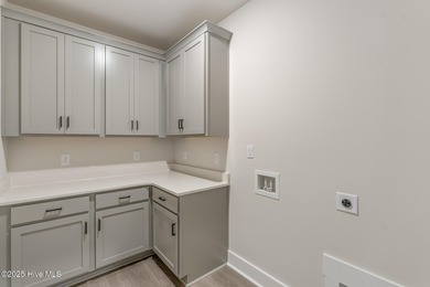 Welcome to your ideal golf and coastal retreat! This beautiful 2 on Brunswick Plantation and Golf Resorts in North Carolina - for sale on GolfHomes.com, golf home, golf lot