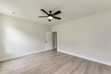 Welcome to your ideal golf and coastal retreat! This beautiful 2 on Brunswick Plantation and Golf Resorts in North Carolina - for sale on GolfHomes.com, golf home, golf lot