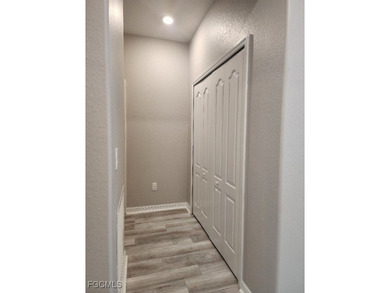 Charming 3-Bedroom, 3-Bath Lake View Home with Assumable FHA on River Hall Country Club in Florida - for sale on GolfHomes.com, golf home, golf lot