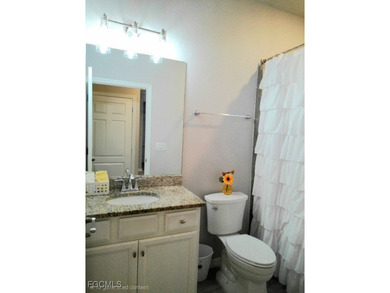 Charming 3-Bedroom, 3-Bath Lake View Home with Assumable FHA on River Hall Country Club in Florida - for sale on GolfHomes.com, golf home, golf lot