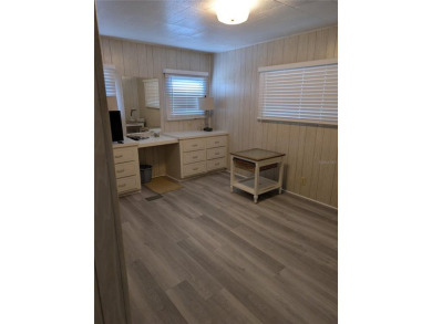 This spacious 3-bedroom, 2-bathroom mobile home offers over 1 on Oyster Creek Golf Club in Florida - for sale on GolfHomes.com, golf home, golf lot