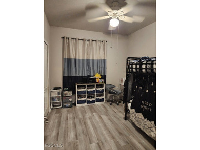 Charming 3-Bedroom, 3-Bath Lake View Home with Assumable FHA on River Hall Country Club in Florida - for sale on GolfHomes.com, golf home, golf lot