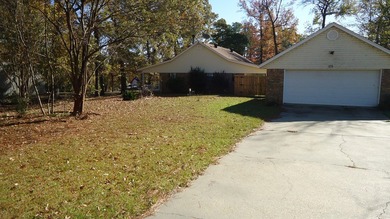 MOTIVATED SELLER        This beautiful brick home is setting on on Cypress Bend Golf Course in Texas - for sale on GolfHomes.com, golf home, golf lot