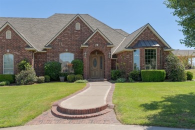 This beautiful home is located on an acre lot in the private on River Oaks Golf Club in Oklahoma - for sale on GolfHomes.com, golf home, golf lot