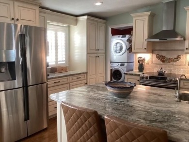 WOW! Truly one of the largest and finest homes in the community on Saint Andrews South Golf Club in Florida - for sale on GolfHomes.com, golf home, golf lot
