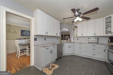 Welcome to 9001 E Carroll Road, a beautifully appointed 4BR/3 on St. Andrews Golf and Country Club in Georgia - for sale on GolfHomes.com, golf home, golf lot