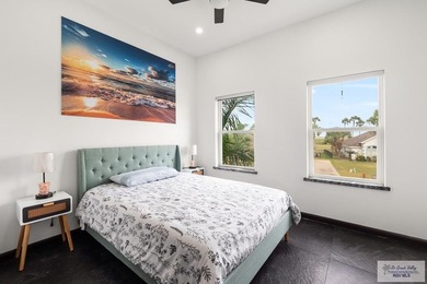 Luxury living in paradise! Located on prestigious Laguna Madre on South Padre Island Golf Club in Texas - for sale on GolfHomes.com, golf home, golf lot