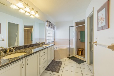 Beautifully updated 1,421 square foot home that features an on Tampa Bay Golf and Country Club in Florida - for sale on GolfHomes.com, golf home, golf lot