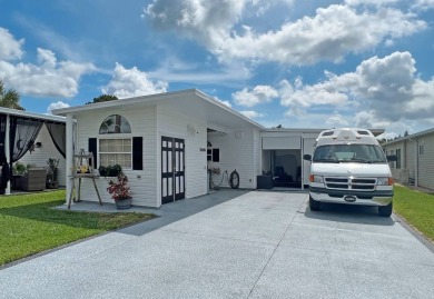 This RV site has 903 sq.ft. of air conditioned living area and on The Great Outdoors Golf and Country Club in Florida - for sale on GolfHomes.com, golf home, golf lot