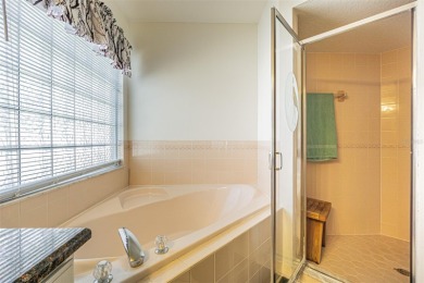 Beautifully updated 1,421 square foot home that features an on Tampa Bay Golf and Country Club in Florida - for sale on GolfHomes.com, golf home, golf lot