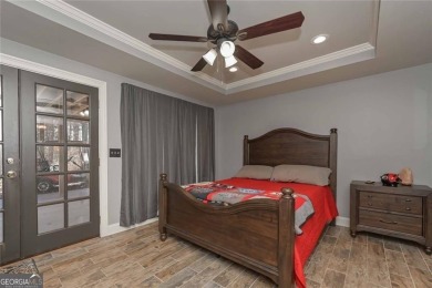 Welcome to 9001 E Carroll Road, a beautifully appointed 4BR/3 on St. Andrews Golf and Country Club in Georgia - for sale on GolfHomes.com, golf home, golf lot