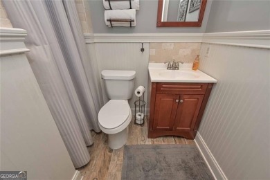 Welcome to 9001 E Carroll Road, a beautifully appointed 4BR/3 on St. Andrews Golf and Country Club in Georgia - for sale on GolfHomes.com, golf home, golf lot