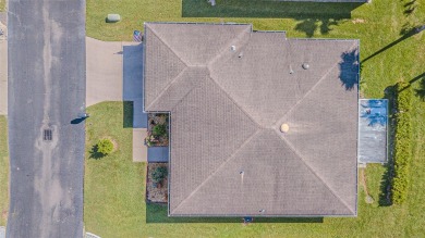 Beautifully updated 1,421 square foot home that features an on Tampa Bay Golf and Country Club in Florida - for sale on GolfHomes.com, golf home, golf lot
