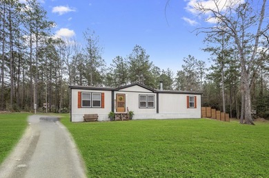 Modern Elegance meets Southern Comfort in this pristine 2022 on Rayburn Country Club in Texas - for sale on GolfHomes.com, golf home, golf lot