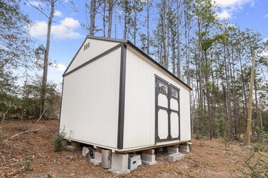 Modern Elegance meets Southern Comfort in this pristine 2022 on Rayburn Country Club in Texas - for sale on GolfHomes.com, golf home, golf lot