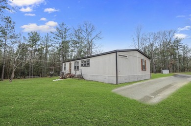 Modern Elegance meets Southern Comfort in this pristine 2022 on Rayburn Country Club in Texas - for sale on GolfHomes.com, golf home, golf lot