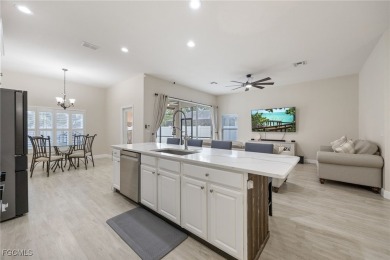 Welcome to Cypress Cay at Gateway! This beautifully maintained on Gateway Golf and Country Club in Florida - for sale on GolfHomes.com, golf home, golf lot