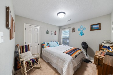 This charming, well-maintained 3 bedroom, 2 bath home is nestled on Silver Springs Country Club in Arkansas - for sale on GolfHomes.com, golf home, golf lot