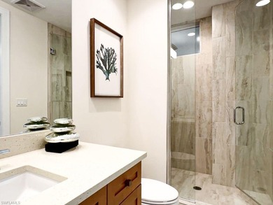 This refined 16th-floor residence in Seaglass at Bonita Bay on Bonita Bay West in Florida - for sale on GolfHomes.com, golf home, golf lot