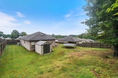 This charming, well-maintained 3 bedroom, 2 bath home is nestled on Silver Springs Country Club in Arkansas - for sale on GolfHomes.com, golf home, golf lot