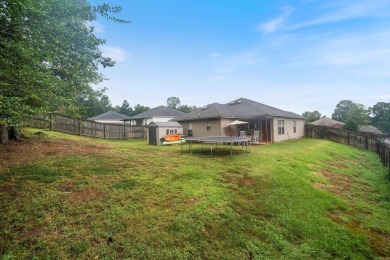 This charming, well-maintained 3 bedroom, 2 bath home is nestled on Silver Springs Country Club in Arkansas - for sale on GolfHomes.com, golf home, golf lot