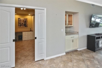 This extraordinary, UPDATED 2 bedroom/2 bath (plus den) on Heritage Palms Golf and Country Club in Florida - for sale on GolfHomes.com, golf home, golf lot