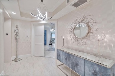 This refined 16th-floor residence in Seaglass at Bonita Bay on Bonita Bay West in Florida - for sale on GolfHomes.com, golf home, golf lot