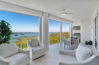 This refined 16th-floor residence in Seaglass at Bonita Bay on Bonita Bay West in Florida - for sale on GolfHomes.com, golf home, golf lot