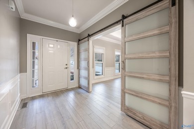 Welcome home to your single level, exceptionally built residence on Hampton Cove Golf Course in Alabama - for sale on GolfHomes.com, golf home, golf lot