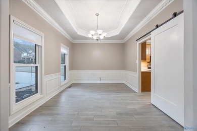 Welcome home to your single level, exceptionally built residence on Hampton Cove Golf Course in Alabama - for sale on GolfHomes.com, golf home, golf lot