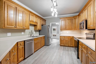 Welcome home to your single level, exceptionally built residence on Hampton Cove Golf Course in Alabama - for sale on GolfHomes.com, golf home, golf lot