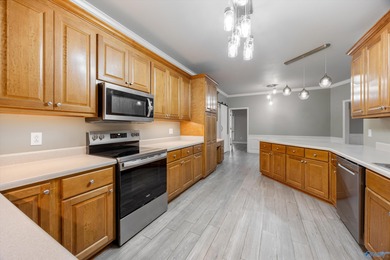 Welcome home to your single level, exceptionally built residence on Hampton Cove Golf Course in Alabama - for sale on GolfHomes.com, golf home, golf lot