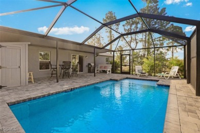 Pool Home Near Coral Oaks Golf Course featuring a great room on Burnt Store Golf Club in Florida - for sale on GolfHomes.com, golf home, golf lot