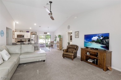 Pool Home Near Coral Oaks Golf Course featuring a great room on Burnt Store Golf Club in Florida - for sale on GolfHomes.com, golf home, golf lot