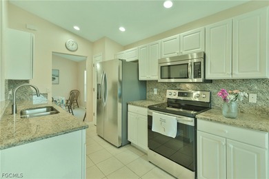 TERRIFIC LOCATION WITH CENTER OF LAKE VIEWS FOR THIS UPDATED on Colonial Country Club in Florida - for sale on GolfHomes.com, golf home, golf lot