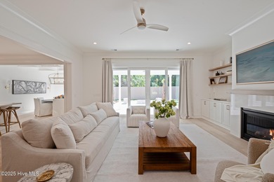 Welcome to your ideal coastal retreat! This beautiful 1.5 story on Crow Creek Golf Club in North Carolina - for sale on GolfHomes.com, golf home, golf lot