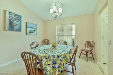 TERRIFIC LOCATION WITH CENTER OF LAKE VIEWS FOR THIS UPDATED on Colonial Country Club in Florida - for sale on GolfHomes.com, golf home, golf lot