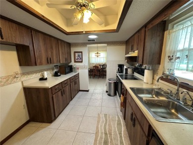 This wonderful 1144 square foot home offers 2 bedrooms, 2 baths on On Top of the World Golf Course in Florida - for sale on GolfHomes.com, golf home, golf lot