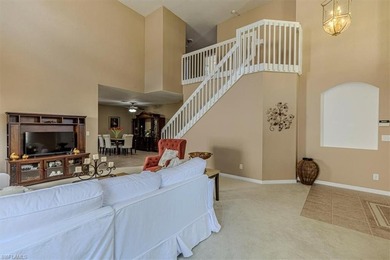 This 4-bed plus den, 2.5-bath two-story residence in Valencia on Valencia Golf and Country Club in Florida - for sale on GolfHomes.com, golf home, golf lot