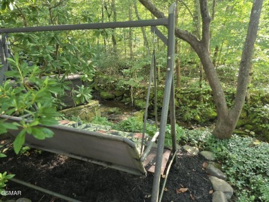 Absolutely beautiful creek front lot with a concrete deck and on Bent Creek Golf Course in Tennessee - for sale on GolfHomes.com, golf home, golf lot