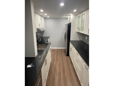 This spacious 2-bedroom, 2-bathroom unit features an open living on Inverrary Country Club in Florida - for sale on GolfHomes.com, golf home, golf lot