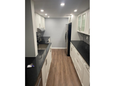 This spacious 2-bedroom, 2-bathroom unit features an open living on  in Florida - for sale on GolfHomes.com, golf home, golf lot