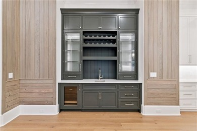 Incredible golf course, lake, and marsh views from one of the on Frederica Golf Club in Georgia - for sale on GolfHomes.com, golf home, golf lot